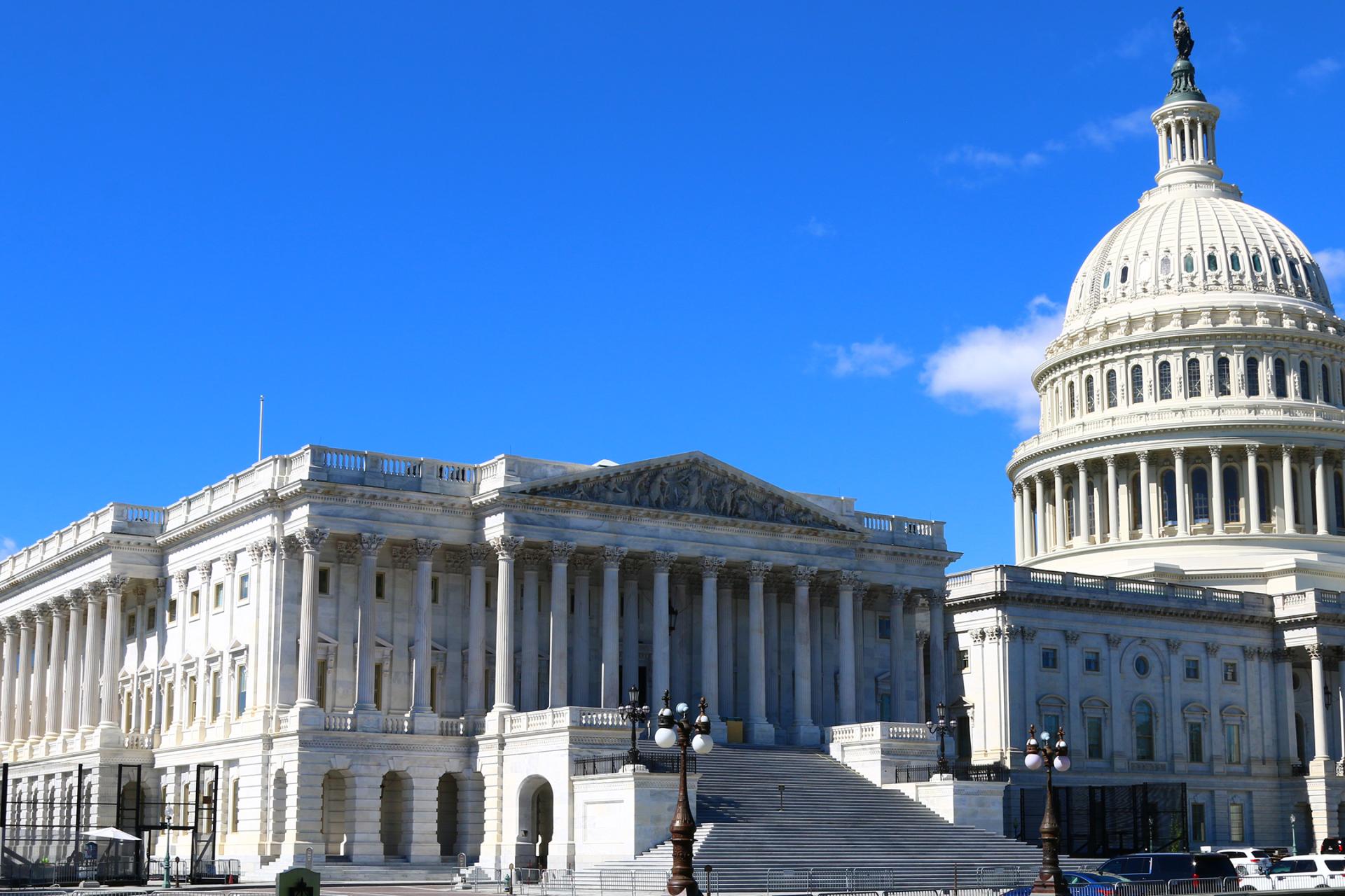 Capitol dome against blue sky